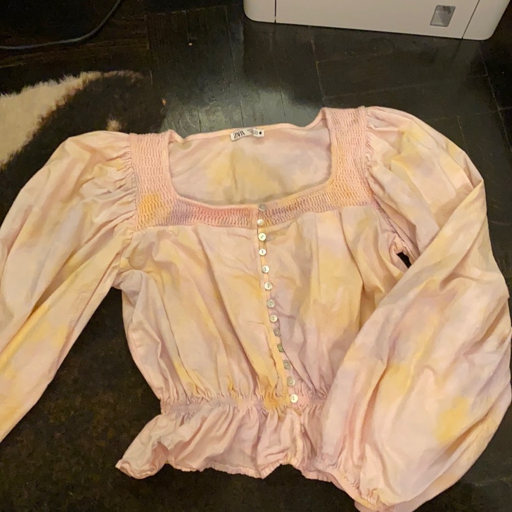 Long sleeve peplum tie dye blouse.